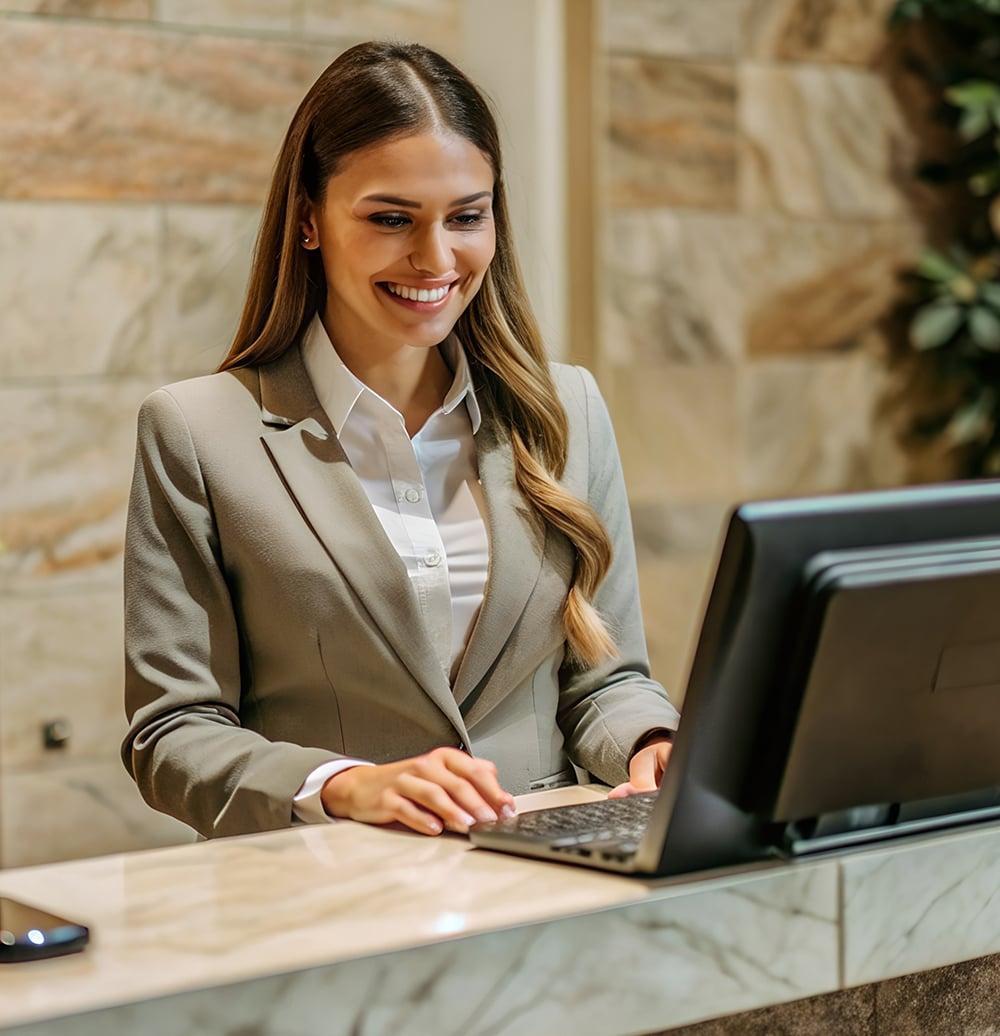 Hotel Receptionist Welcoming Guests with a Smile - Excellent Customer Service